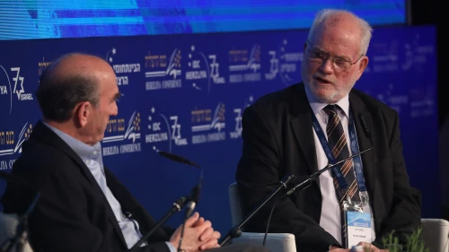 Maj. Gen. (Ret.) Amos Gilead (right) speaks with former Bush administration official Elliott Abrams. Credit: Herzliya Conference.