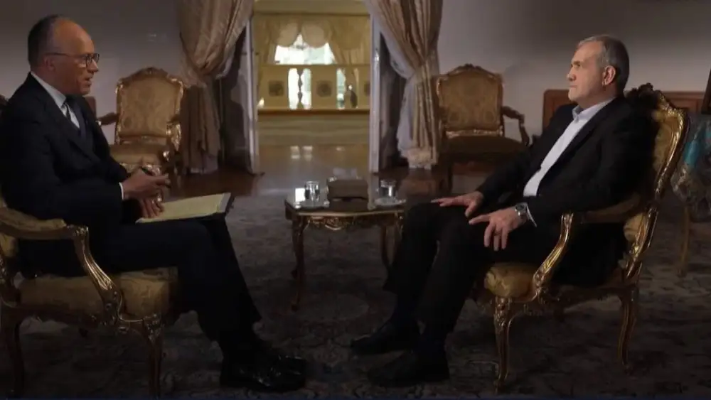 Iranian President Masoud Pezeshkian, right, speaks with NBC's Lester Holt in January 2025. Photo taken out of the NBC interview.