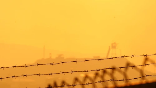 The sun sets over a United Nations outpost in Southern Lebanon, as seen from the northern Israeli town of Manara, July 24, 2006. Photo by Anna Kaplan/Flash90.