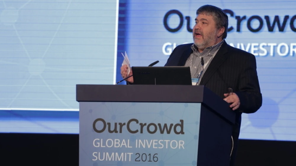 Jonathan Medved, founder and CEO of OurCrowd, the leading global-equity crowdfunding platform for accredited investors, speaks at the OurCrowd Global Investor Summit in Jerusalem. Credit: Courtesy.