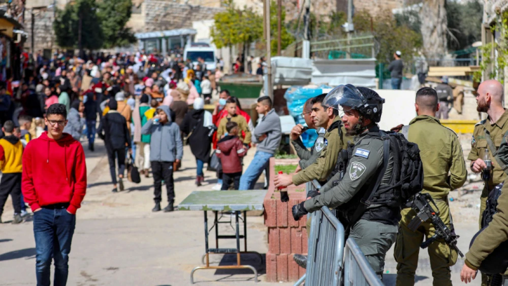 Palestinians near the Cave of the Patriarchs in Hebron, on Feb. 28, 2022 Photo by Wisam Hashlamoun/Flash90.