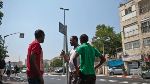 A group of young Eritrean people in Jerusalem, July 2012. Photo by Noam Moskowitz/Flash90.
