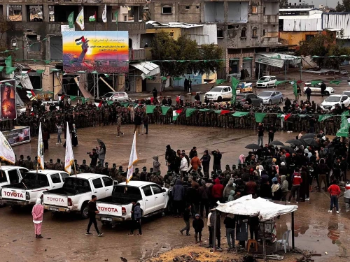 Palestinian terrorists prepare to release Israeli hostages in southern Gaza's Rafah, Feb. 22, 2025. Photo by Saeed Mohammed/Flash90.