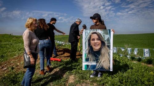 Friends and family of Liraz Assulin, who was murdered by Hamas terrorists in the Oct. 7 massacre, plant a tree in her memory at the place where she was murdered near the Israeli border with the Gaza Strip, southern Israel Jan. 21, 2024. Photo by Chaim Goldberg/Flash90.