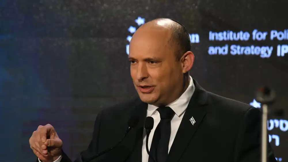 Israeli Prime Minister Naftali Bennett gives a speech at Reichman University in Herzliya, Nov. 23, 2021. Credit: Amos Ben Gershom/GPO.