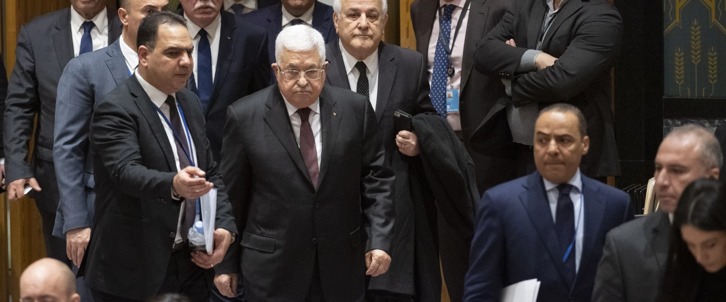 Palestinian Authority leader Mahmoud Abbas enters a U.N. Security Council meeting on the situation in the Middle East, including the Palestinian question, Feb. 2020. Credit: U.N. Photo/Evan Schneider.