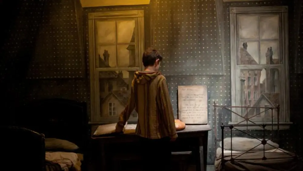 A young visitor examines a display in the United States Holocaust Memorial Museum’s “Remember the Children: Daniel’s Story,” designed for children 8 and older. Credit: United States Holocaust Memorial Museum.