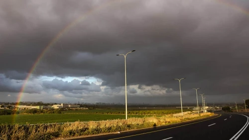A rainbow is seen during rainfall in Rosh HaAyin, Feb. 7, 2025. Photo by Yossi Aloni/Flash90.