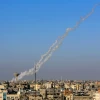 Smoke trails are seen as a rocket is launched from Rafah in the southern Gaza Strip to Israel on May 4, 2019. Credit: Abed Rahim Khatib/Flash90.