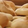 Click photo to download. Caption: Bialys from Kossar's, formerly owned by Juda Engelmayer and his wife. Credit: YouTube.