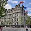 People walk by Montreal City Hall on July 14, 2019 in Montreal, Quebec. Photo by Daniel Slim/AFP via Getty Images.