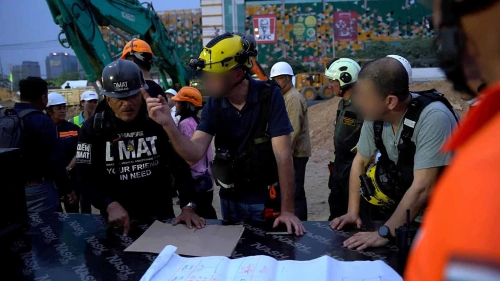 An Israeli delegation of experts from the IDF and the Defense Ministry arrived at Bangkok on March 30, 2025, to begin assisting the local authorities in rescue efforts of workers trapped underneath a building that collapsed due to a regional earthquake. Credit: IDF.