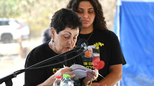 Former Hamas-held hostage Nurit Cooper, wife of slain hostage Amiram Cooper, eulogizes her husband during his funeral at Kibbutz Nir Oz, Nov. 2, 2025. Photo by Uriel Even Sapir/Hostages and Missing Families Forum.