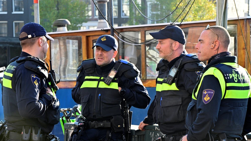 Police officers stand outside the City Council building of Amsterdam, the Netherlands, on November 12, 2024. (Photo by NICK GAMMON/AFP via Getty Images)