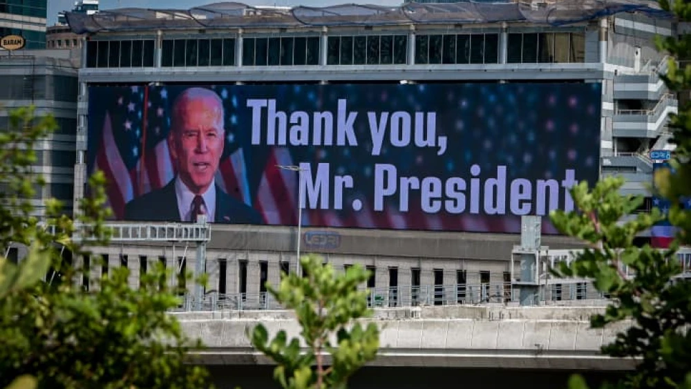 A large billboard thanking U.S. President Joe Biden for his support of Israel is displayed above the Ayalon Highway in Ramat Gan, Oct. 11, 2023. Photo by Avshalom Sassoni/Flash90.