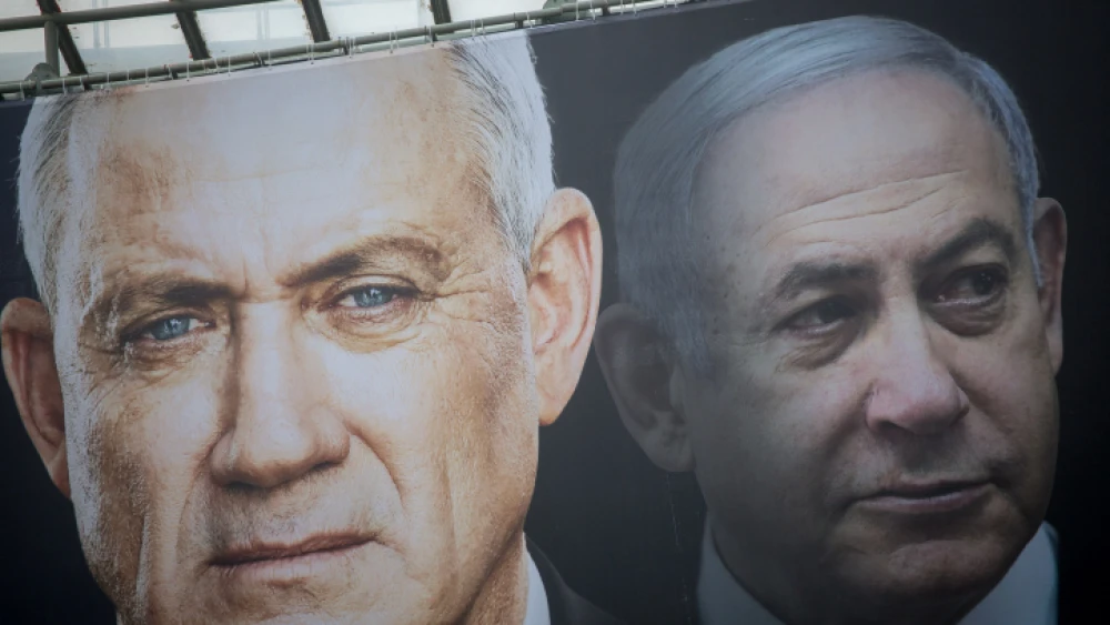 Election posters hung by the Blue and White Party show candidate Benny Gantz and Likud candidate, Israeli Prime Minister Benjamin Netanyahu, on Feb. 18, 2020. Photo by Miriam Alster/Flash90.