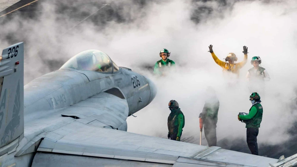 A U.S. fighter jet readies to lift off from the USS Harry S. Truman aircraft carrier for operations in the U.S. Central Command area of responsibility. Source: @CENTCOM/X.