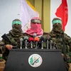 Abu Ubaida (center), a spokesman for Hamas’s “military wing,” speaks in the southern Gaza town of Rafah on Jan. 31, 2017. Credit: Abed Rahim Khatib/Flash90.
