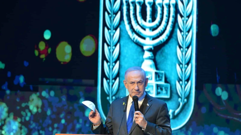 Israeli Prime Minister Benjamin Netanyahu delivering an address at the Police Academy in Beit Shemesh during a candle-lighting event for Chanukah, Dec. 14, 2025. Photo by Amos Ben Gershom/GPO.