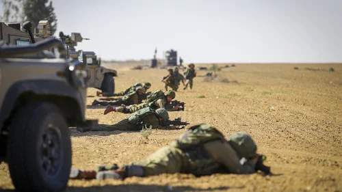 Israeli soldiers participate in a drill simulating the infiltration of terrorists from Gaza in southern Israel Dec. 6, 2016. Credit: Flash90.