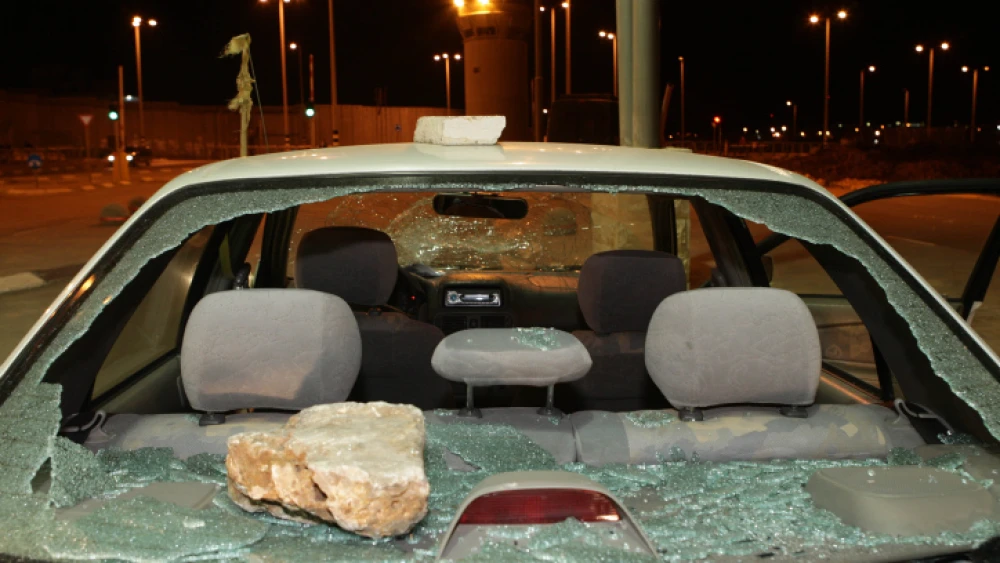 An Israeli car at Kalandia checkpoint outside Jerusalem, after being attacked with stones in Ramallah, Dec. 13, 2007. Photo: Kobi Gideon/Flash90.