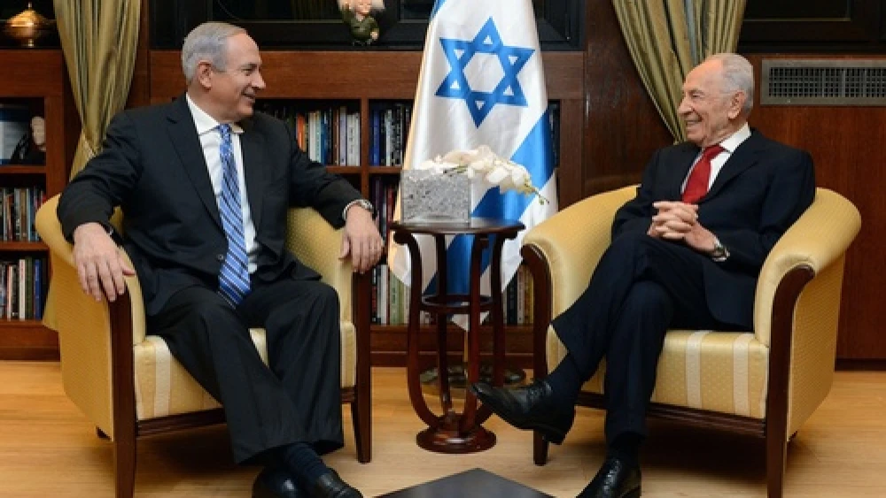 Click photo to download. Caption: Israeli Prime minister Benjamin Netanyahu meets Israeli President Simon Peres on March 16 in Jerusalem to inform Peres that he has formed an Israeli government coalition with the Yesh Atid, Jewish Home and Movement parties. Credit: Kobi Gideon/GPO/FLASH90.