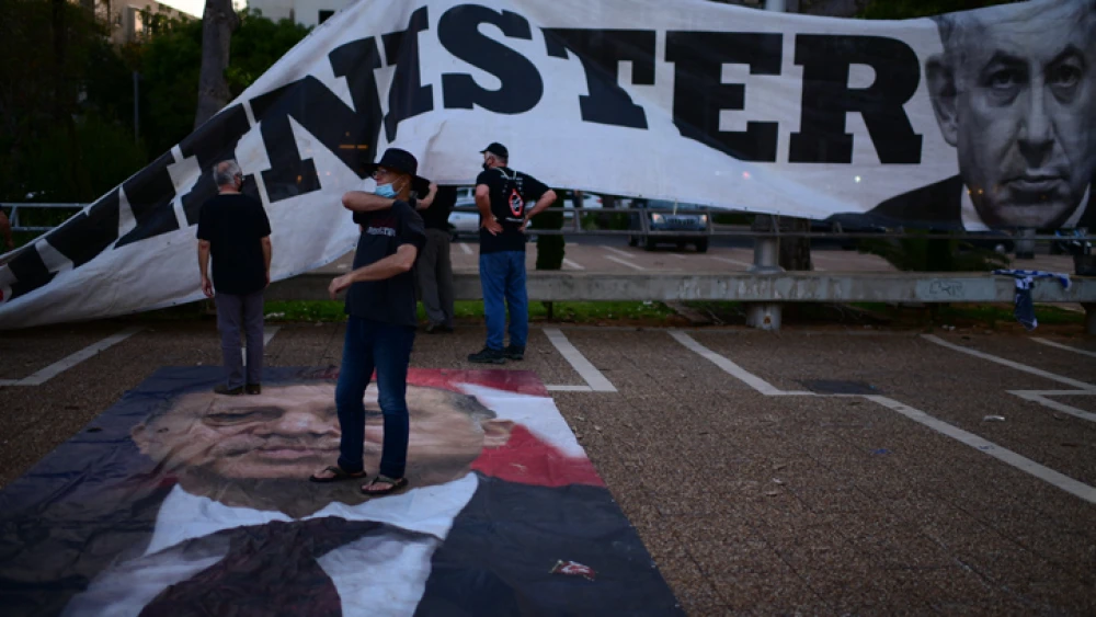 Setting up for a rally against Israeli Prime Minister Benjamin Netanyahu and the coronavirus emergency regulations at Rabin Square in Tel Aviv on June 4, 2020. Photo by Tomer Neuberg/Flash90.