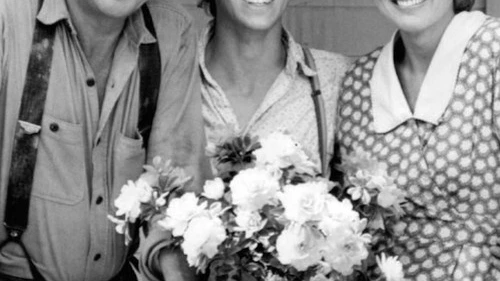 Click photo to download. Caption: John, John-Boy, and Olivia Walton of "The Waltons." Credit: CBS Television via Wikimedia Commons.