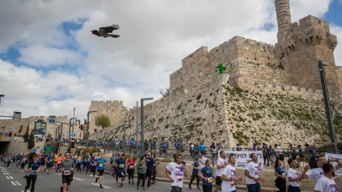Thousands of runners take part in the 2019 international Jerusalem Marathon in the Old City on March 15, 2019. Credit: Yonatan Sindel/Flash90.