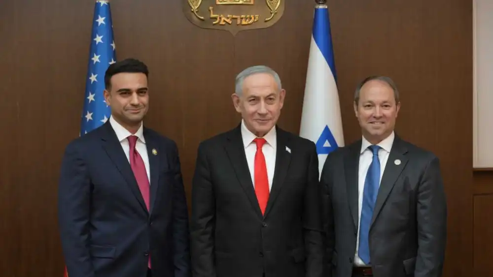 Israeli Prime Minister Benjamin Netanyahu, center, poses with U.S. Reps. Abraham Hamadeh, R-Ariz., left, and Marlin Stutzman, R-Ind., during a meeting at the Prime Minister's Office in Jerusalem, May 27, 2026. Photo by Amos Ben-Gershom/GPO.