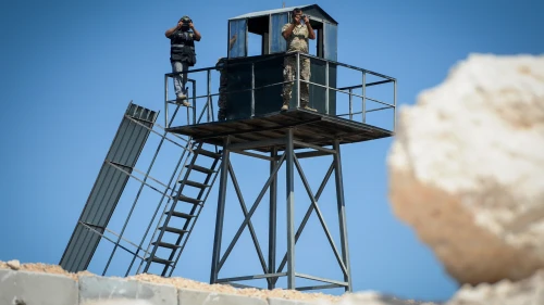 Lebanese soldiers and a member of Hezbollah on the border between Israel and Lebanon on Sept. 5, 2018. Photo by Basel Awidat/Flash90.