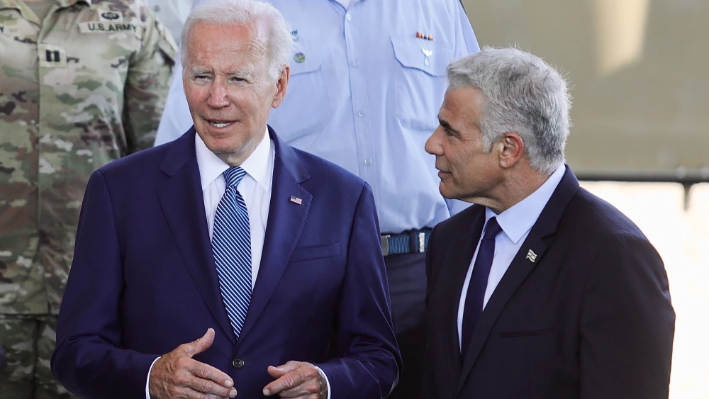 U.S. President Joe Biden and Israeli Prime Minister Yair Lapid review some of Israel's advanced air-defense systems after Biden's arrival at Ben-Gurion Airport, near Tel Aviv, on July 13, 2022. Photo by Marc Israel Sellem/POOL.