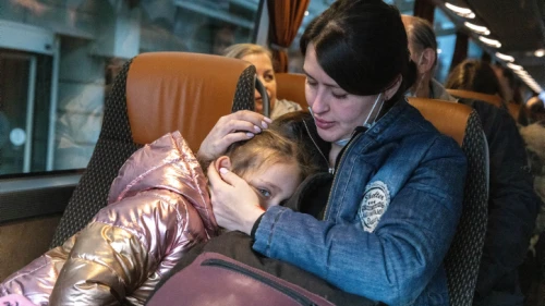 Jewish Ukrainians who fled war zones in Ukraine, seen leaving for the airport to board a Jewish Agency plane to Israel, March 6, 2022, in Warsaw, Poland. Photo by Olivier Fitoussi/Flash90.