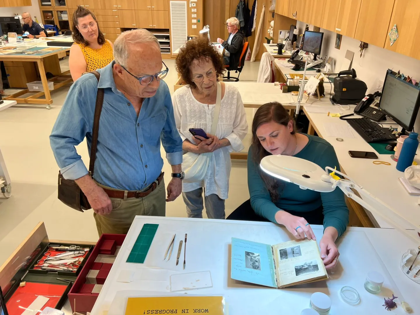 Efraim Kochba explains the journal kept by his adoptive mother, Jacqueline Meents-Lenstra, during a visit to Yad Vashem in Jerusalem in May 2025. Credit: Yad Vashem.
