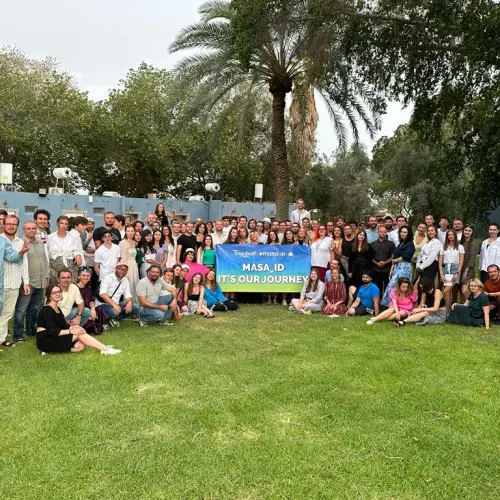 Young Russian-speaking professionals take a break in Tel Aviv during their educational program. Credit: Masa Israel Journey.