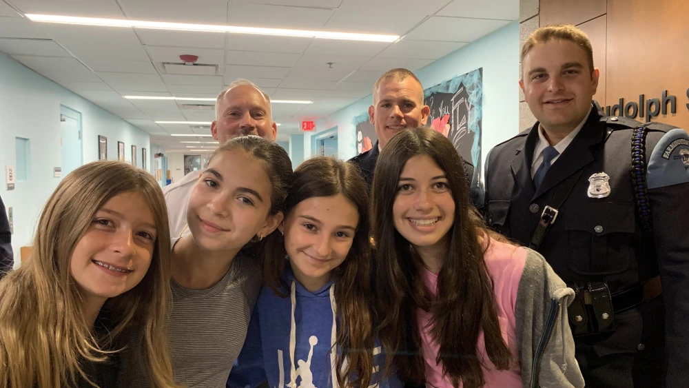 Hillel Day School students pictured with Chief Jeff King, Officer Nick West, and Officer Steve Syoen