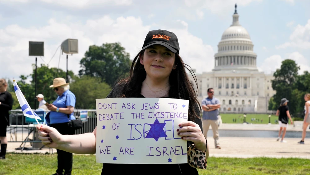 An attendee gathers for the “No Fear: A Rally in Solidarity With the Jewish People” on the National Mall in Washington, D.C., on July 11, 2021. Credit: Chris Kleponis.