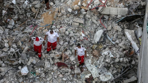 Palestinians gather at the scene where senior Palestinian Islamic Jihad commander Khaled Mansour was killed by an Israeli airstrike, in Rafah in the southern Gaza Strip, on Aug. 7, 2022. Photo by Attia Muhammed/Flash90.