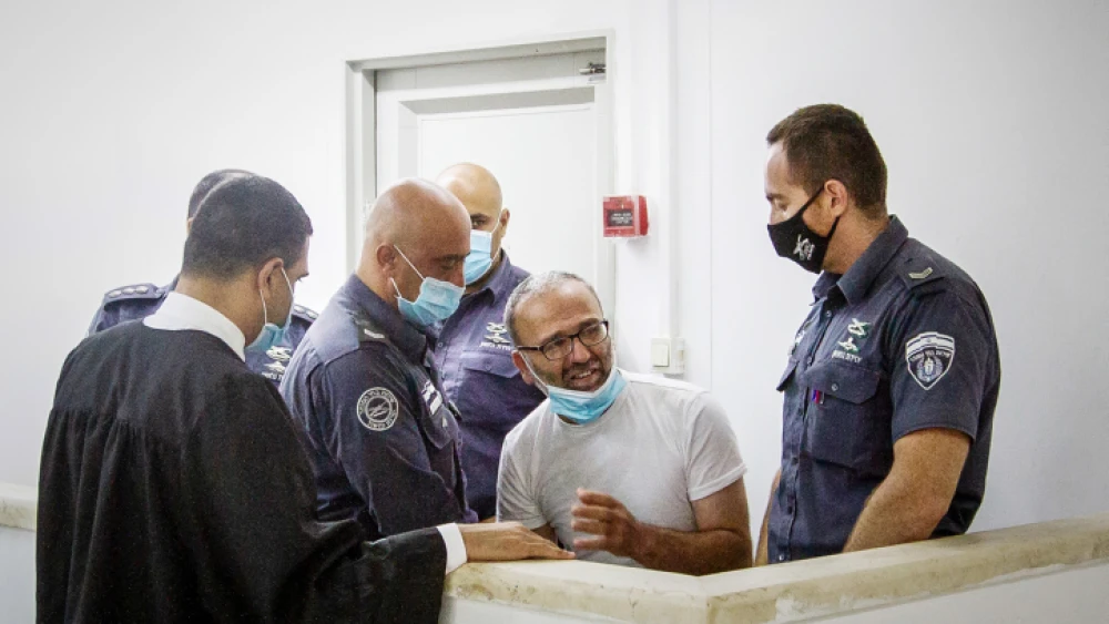 Nazmi Abu Bakr, the Palestinian terrorist who murdered IDF soldier Amit Ben-Yigal, arrives for a hearing at the Samaria military court on June 25, 2020. Photo by Flash90.