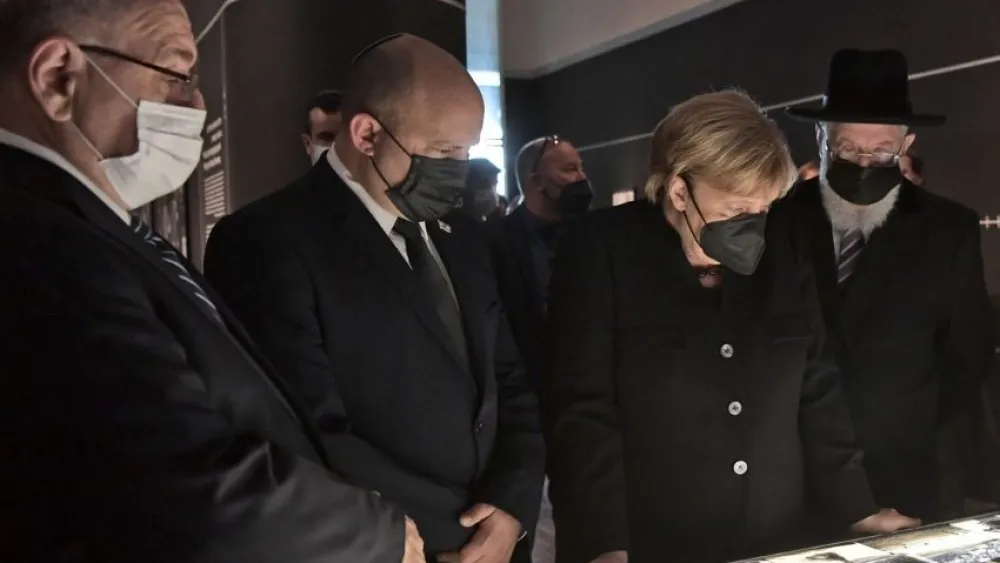 German Chancellor Angela Merkel (second from right) visits Yad Vashem, Oct. 10, 2021. Photo by Koby Gideon/GPO.