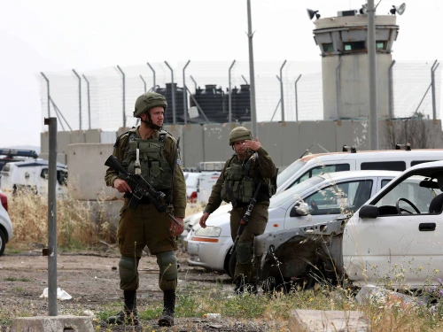 Israeli soldiers at the scene of a car-ramming attack in the Hebron Hills, May 14, 2020. Photo by Wisam Hashlamoun/Flash90.