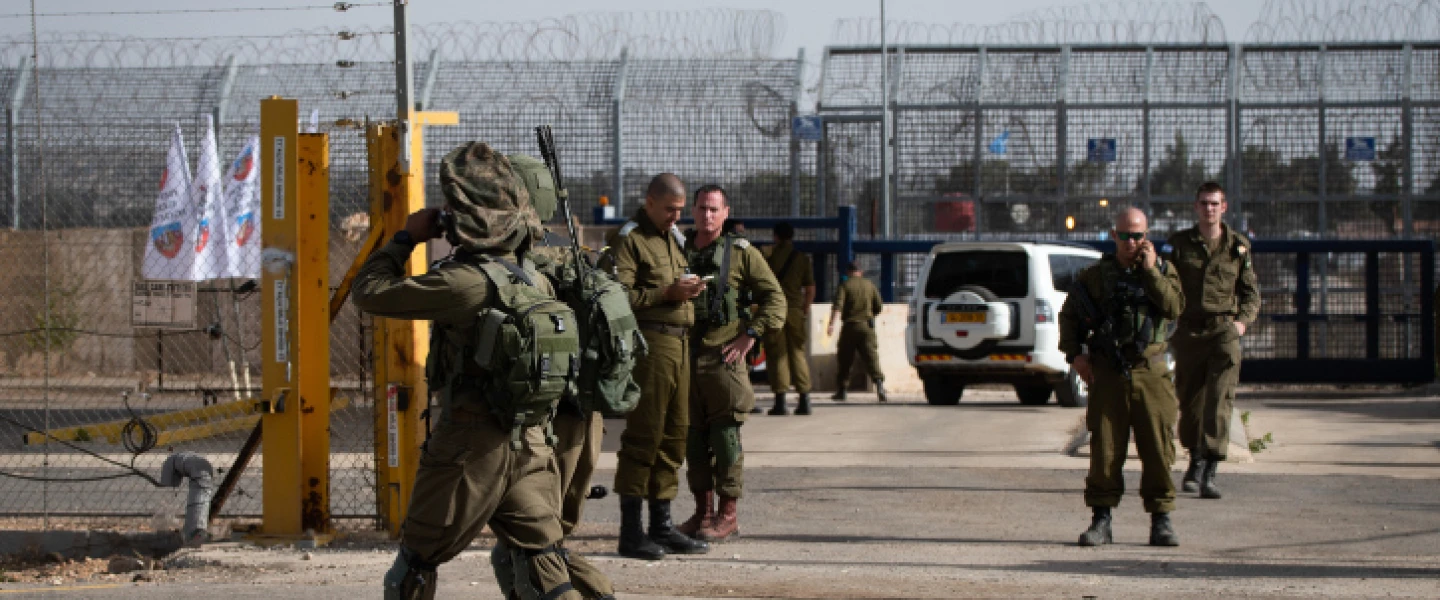 Israeli soldiers guard the Israeli side of the Quneitra Crossing on the Israel-Syria border in the Golan Heights on Oct. 15, 2018. Photo by Basel Awidat/Flash90.