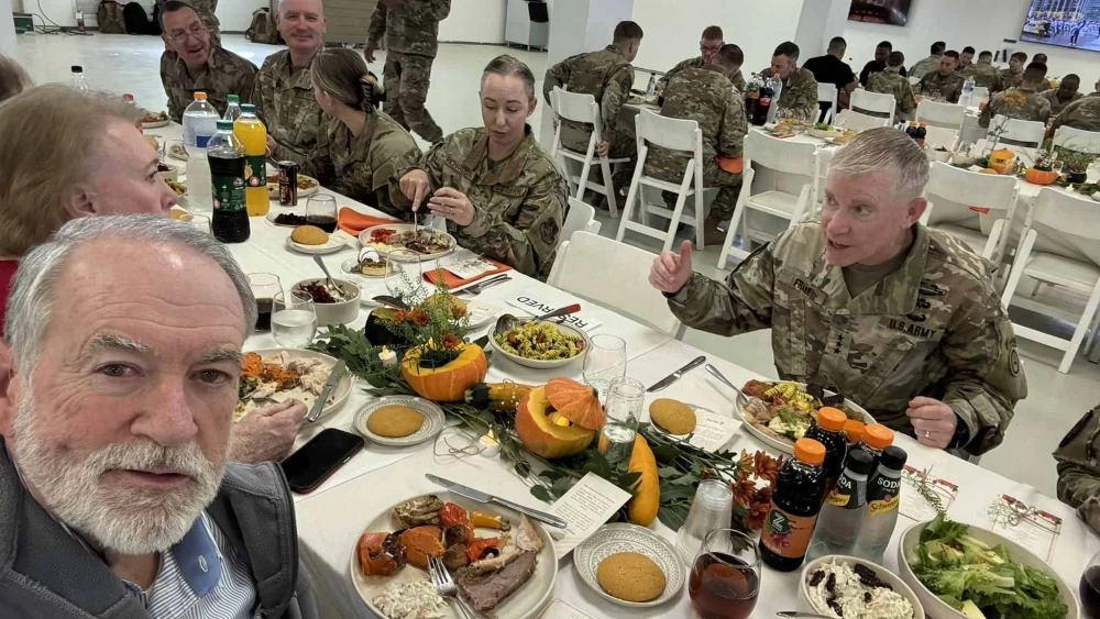 U.S. Ambassador to Israel Mike Huckabee and his wife, Janet, celebrate Thanksgiving together with American service members stationed in Kiryat Gat, Israel, on Nov. 27, 2025. Credit: The U.S. Embassy Jerusalem.