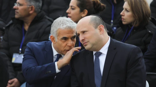 Then-Prime Minister Naftali Bennett and Foreign Minister Yair Lapid at Ben-Gurion Airport, March 21, 2022. Credit: Marc Israel Sellem/POOL.