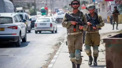 Israeli soldiers patrol at the scene of a deadly terror attack in Huwara, near Nablus in Judea and Samaria, Aug. 20, 2023. Photo by Nasser Ishtayeh/Flash90.