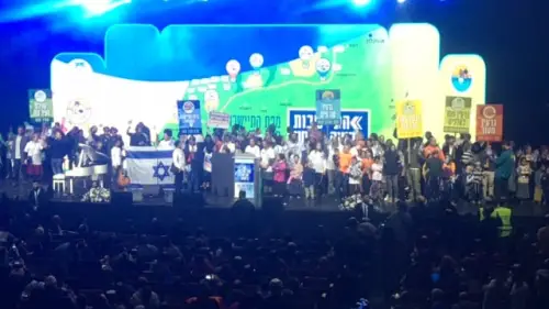 Families prepared to live in the Gaza Strip take the stage at the "Settlement Brings Security" conference at the International Convention Center in Jerusalem, Jan. 28, 2024. Photo by David Isaac.