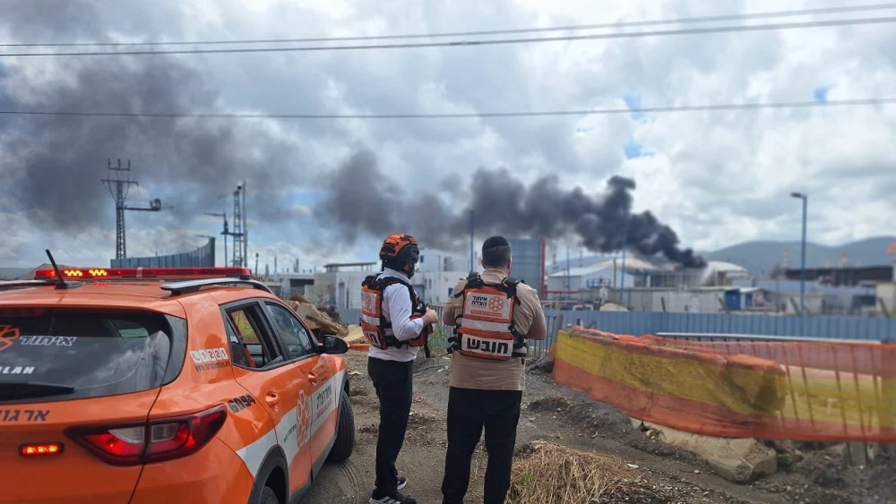 United Hatzalah medics work near the Haifa oil refineries following rocket fire toward northern Israel, Monday, March 30, 2026. Credit: United Hatzalah.