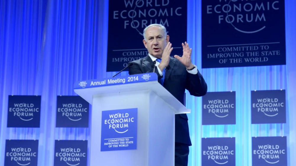 Israeli Prime Minister Benjamin Netanyahu speaks at the annual meeting of the World Economic Forum in Davos, Switzerland, on Jan. 23, 2014. Photo by Kobi Gideon/GPO/Flash 90.