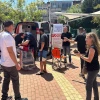 Students gather in front of a Magen David Adom ambulance during the Afeka College of Engineering hackathon which was held in cooperation with the life-saving emergency organization. Credit: Courtesy.