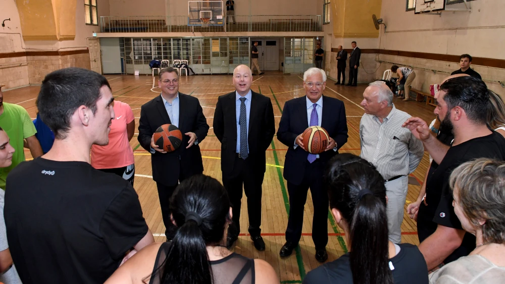 U.S. Assistant to the President and Special Representative for International Negotiations Jason Greenblatt takes time to talk to Israeli and Palestinian basketball coaches in Jerusalem on July 11, 2017. Photo by Matty Stern/U.S. Embassy Tel Aviv.